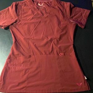 Smitten SML Scrub top with 5 pockets.